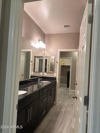 a kitchen with a sink and stove