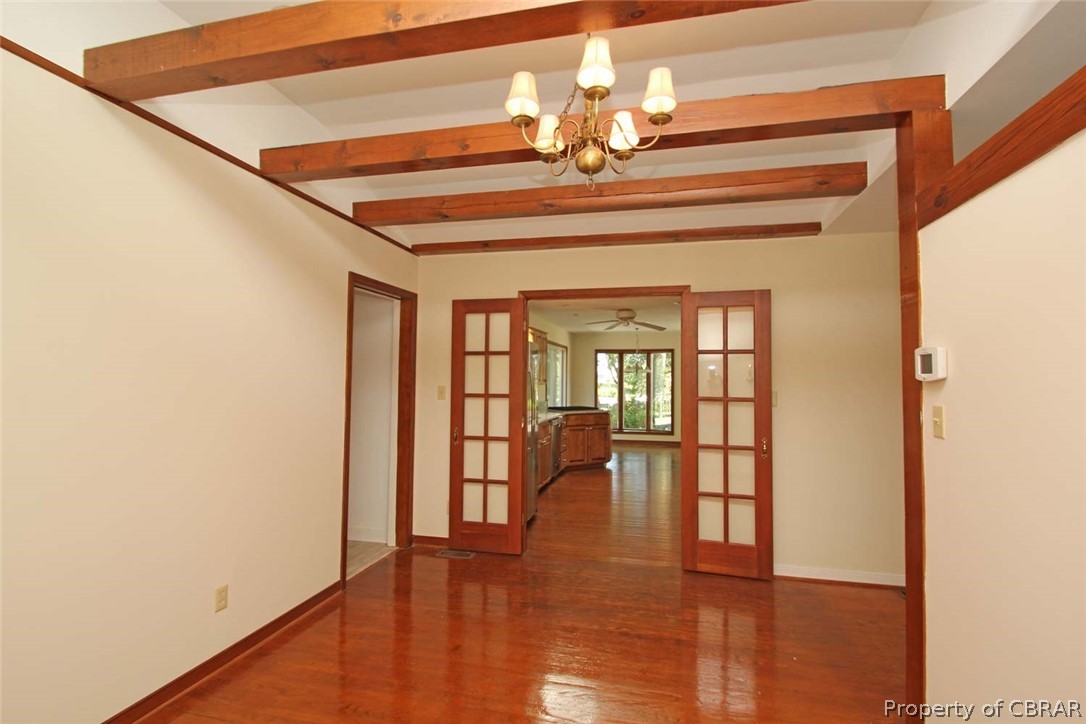 1621 Locust Grove Road Topping, VA 23169 - Photo 25 of 48 Dining Room with a Beautiful Beamed Ceiling