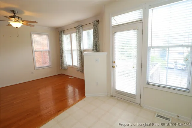 a view of balcony with furniture