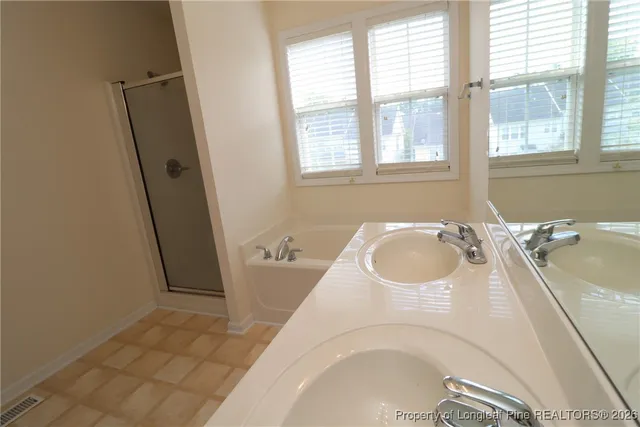 a close up of a bathtub in a bathroom