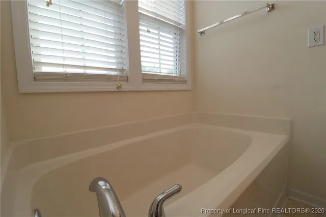 a view of a hallway with staircase