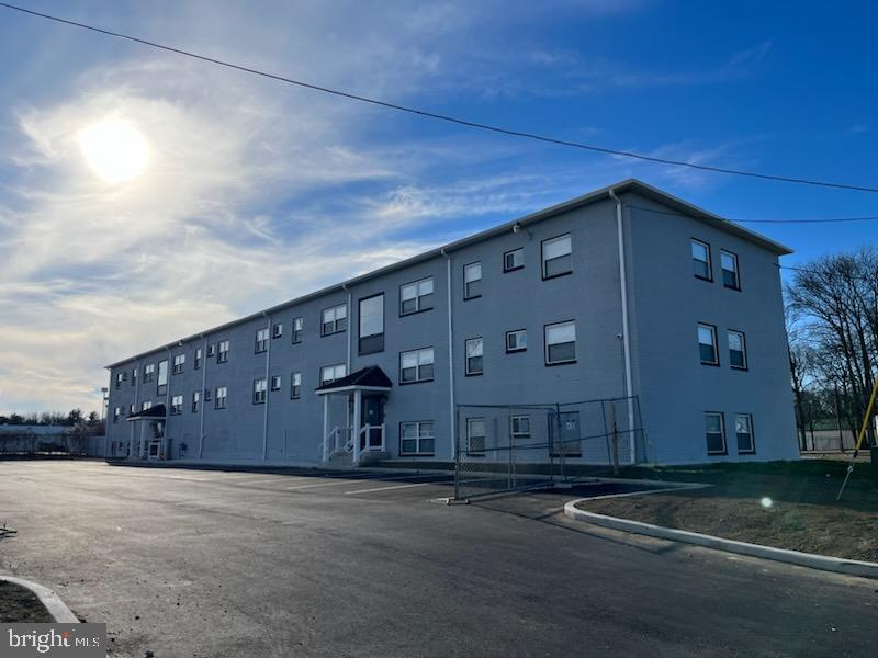 910 Gateway Boulevard, Unit A6 Westville, NJ 08093 - Photo 1 of 12 a building view with a outdoor space