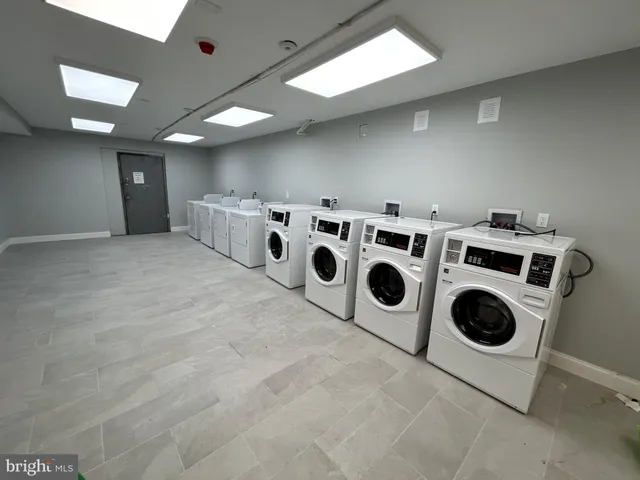 a view of a utility room with washer and dryer