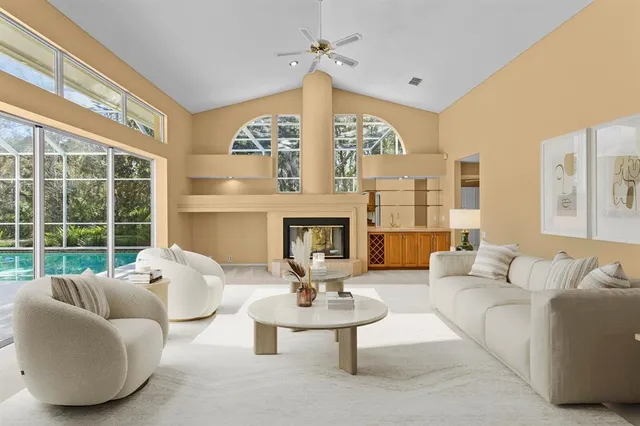a kitchen with stainless steel appliances kitchen island granite countertop a sink and cabinets