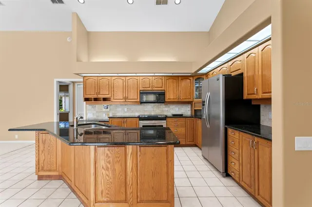 a large bathroom with a large tub and shower
