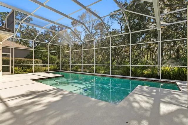 a view of a swimming pool with a sitting space