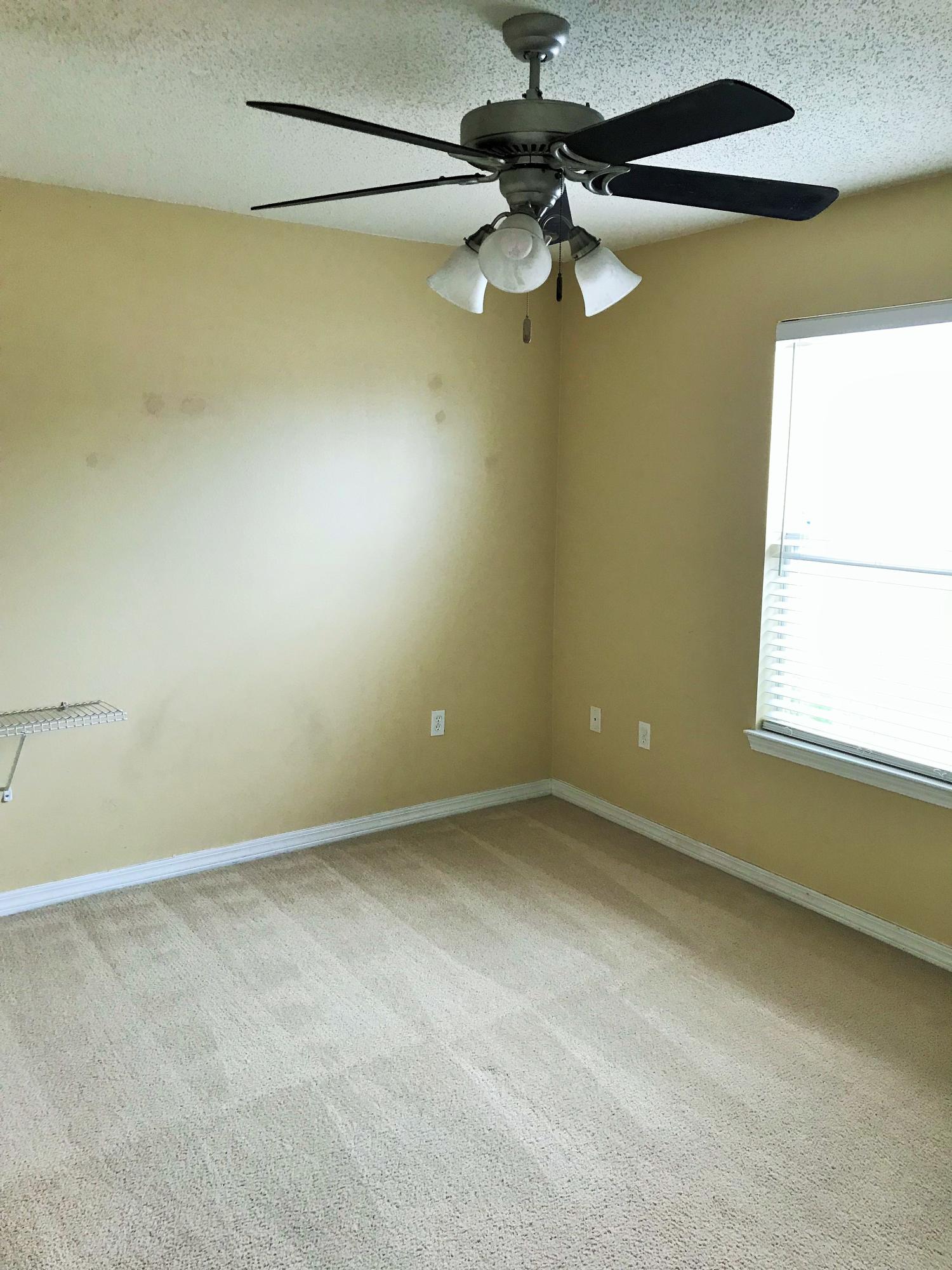 293 Limestone Circle Crestview, FL 32539 - Photo 14 of 20 a view of an empty room with a window