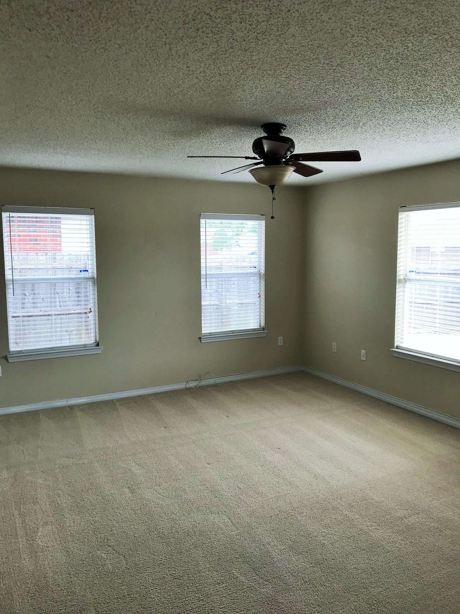 293 Limestone Circle Crestview, FL 32539 - Photo 16 of 20 an empty room with windows