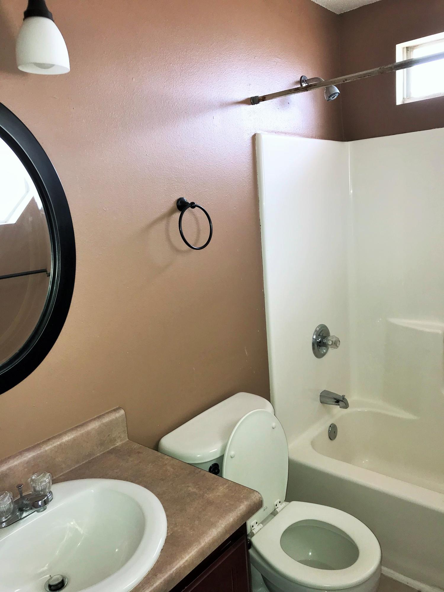 293 Limestone Circle Crestview, FL 32539 - Photo 17 of 20 a bathroom with a sink and a mirror