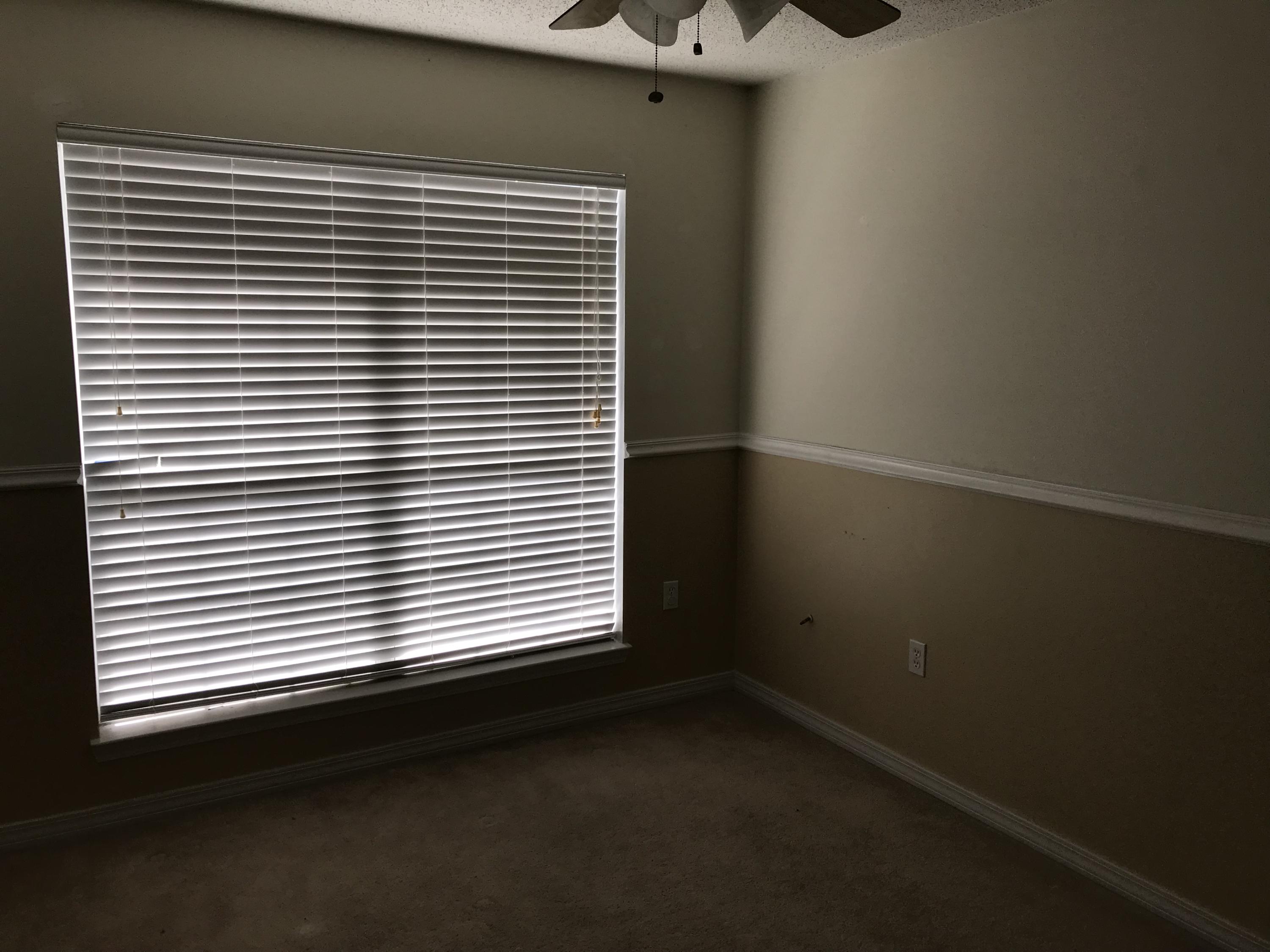 293 Limestone Circle Crestview, FL 32539 - Photo 3 of 20 an empty room with a window