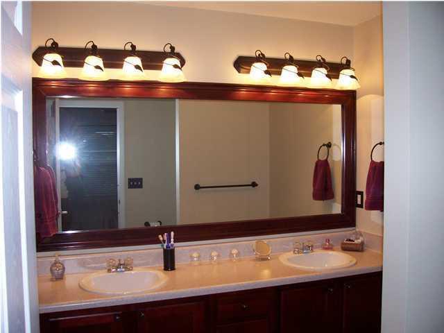293 Limestone Circle Crestview, FL 32539 - Photo 4 of 20 a bathroom with a sink and a mirror