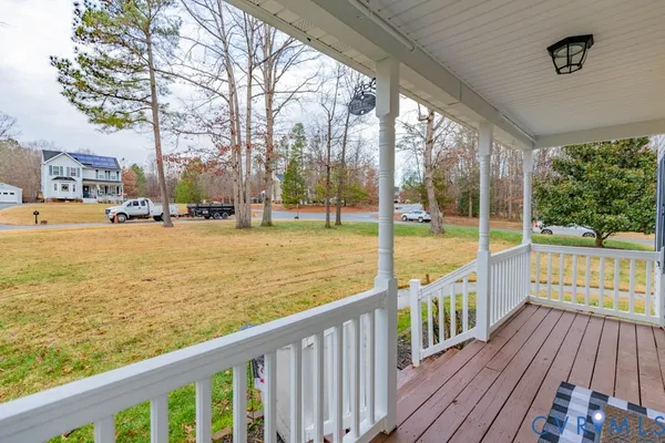 a view of a balcony with ocean view
