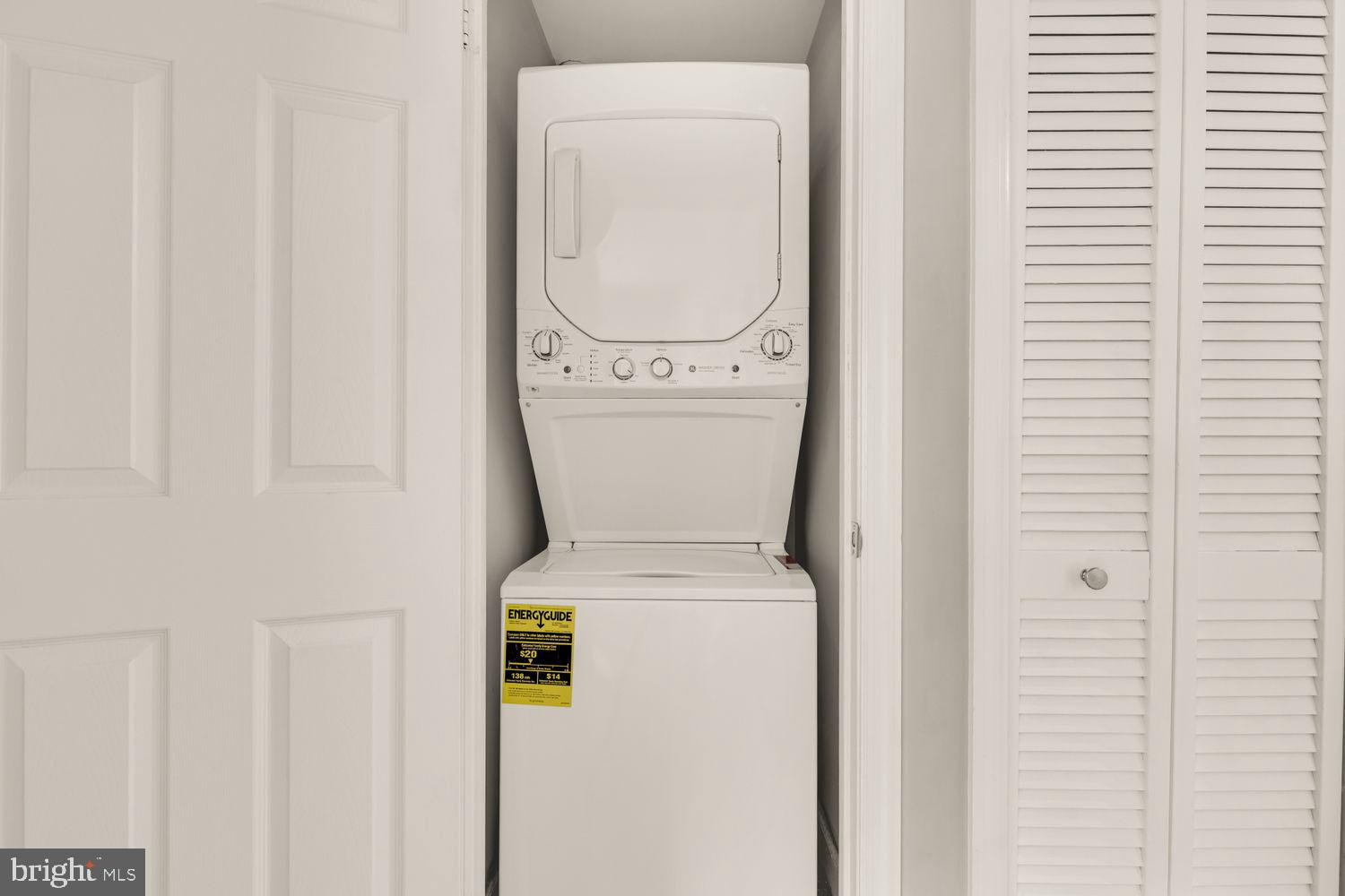 1750 Harvard Street Northwest, Unit 3C Washington, DC 20009 - Photo 21 of 29 a utility room with dryer and washer