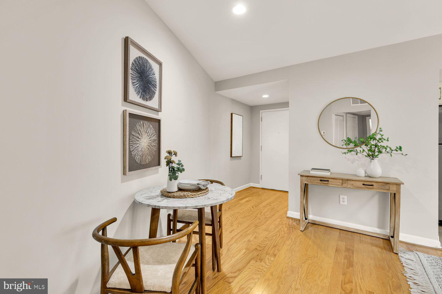 1750 Harvard Street Northwest, Unit 3C Washington, DC 20009 - Photo 8 of 29 a view of a livingroom with furniture and a potted plant