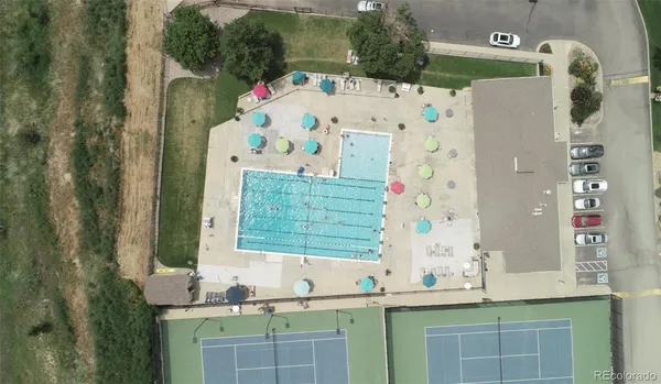 a view of a golf course with a swimming pool