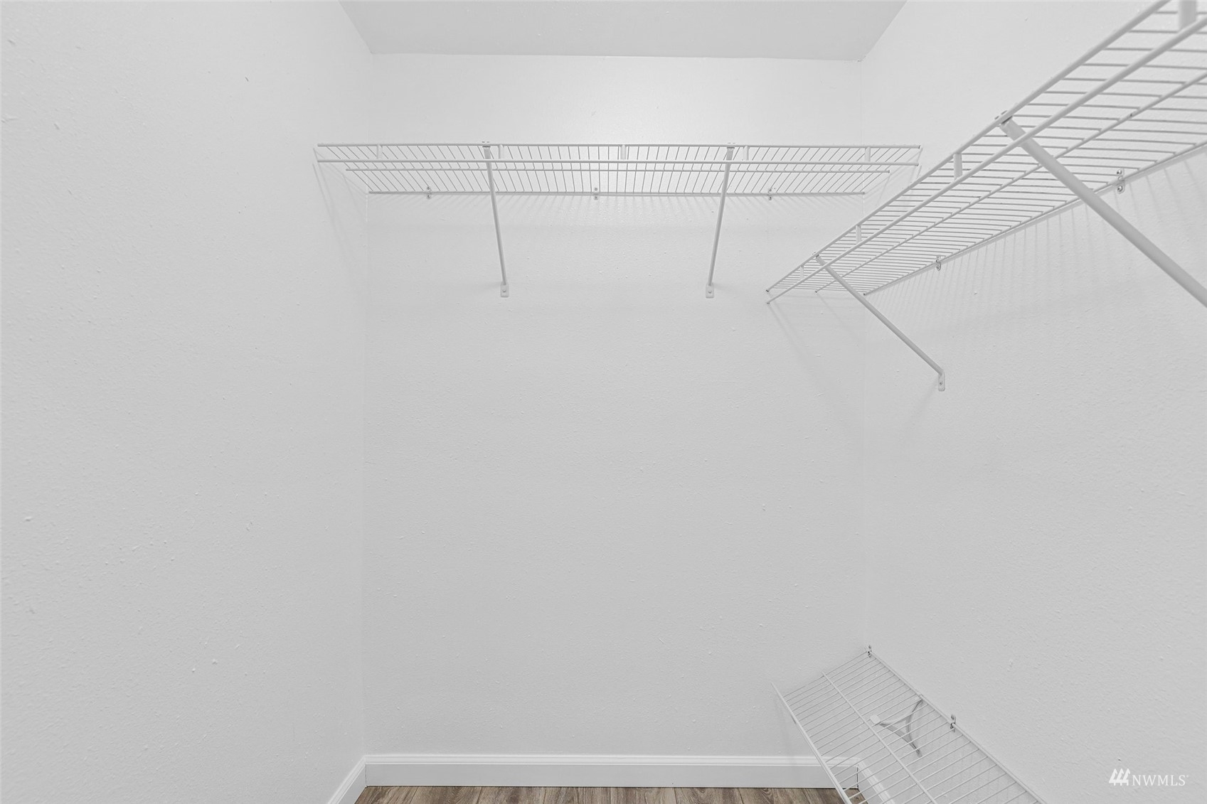 25 Rips Lane Southwest Lakewood, WA 98499 - Photo 19 of 33 a view of a room with racks on the wall