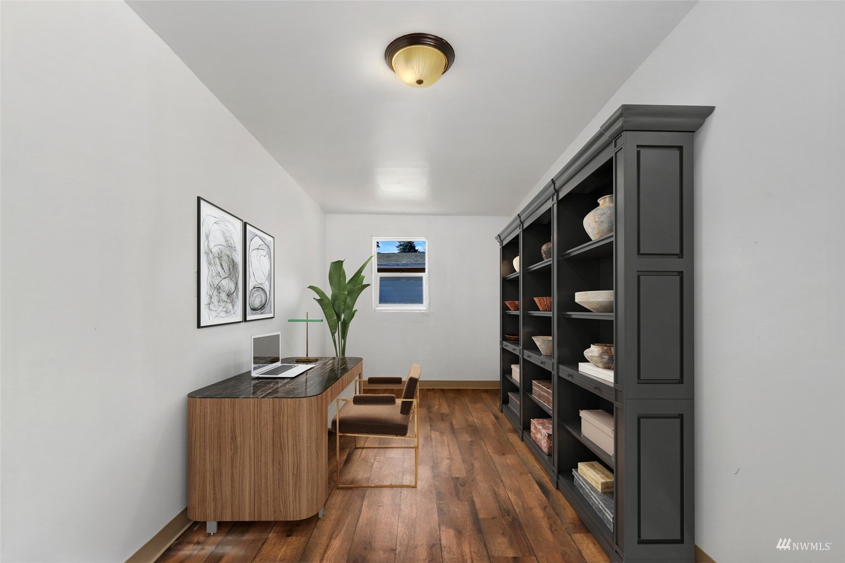25 Rips Lane Southwest Lakewood, WA 98499 - Photo 26 of 33 a view of a workspace with furniture and wooden floor