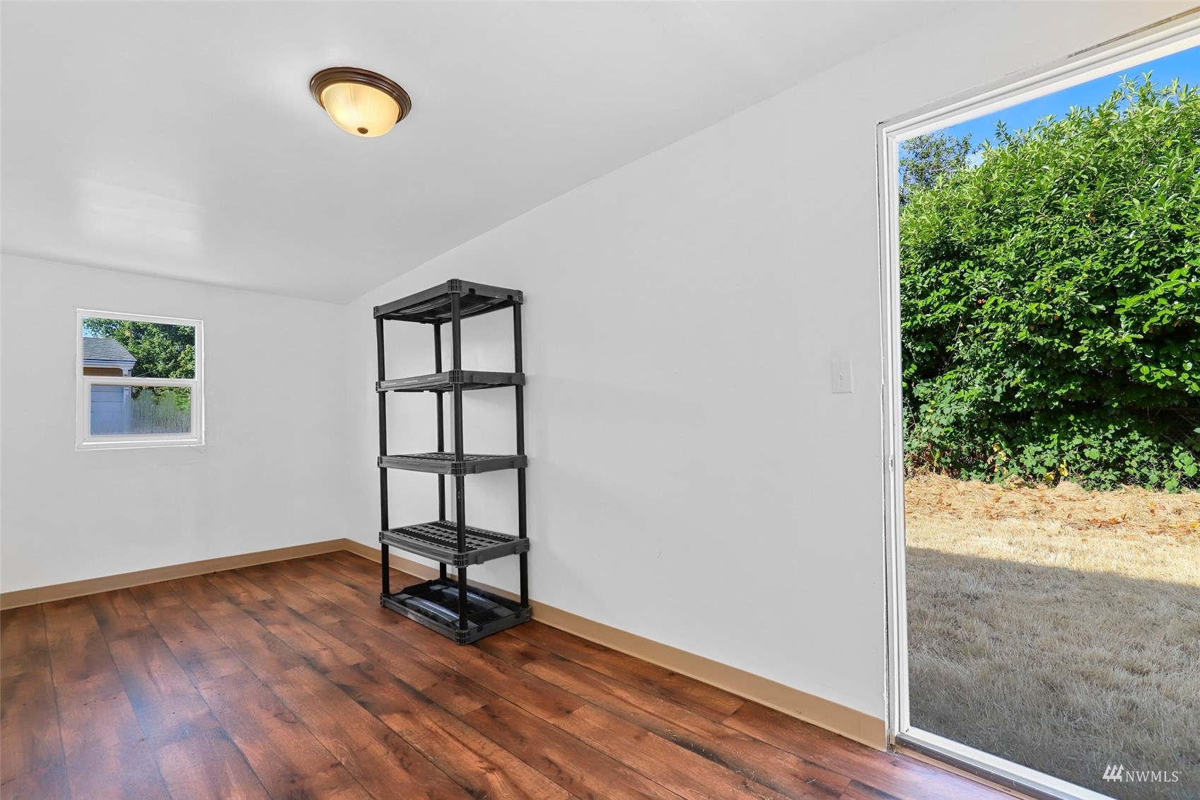 25 Rips Lane Southwest Lakewood, WA 98499 - Photo 28 of 33 wooden floor in an empty room with a window