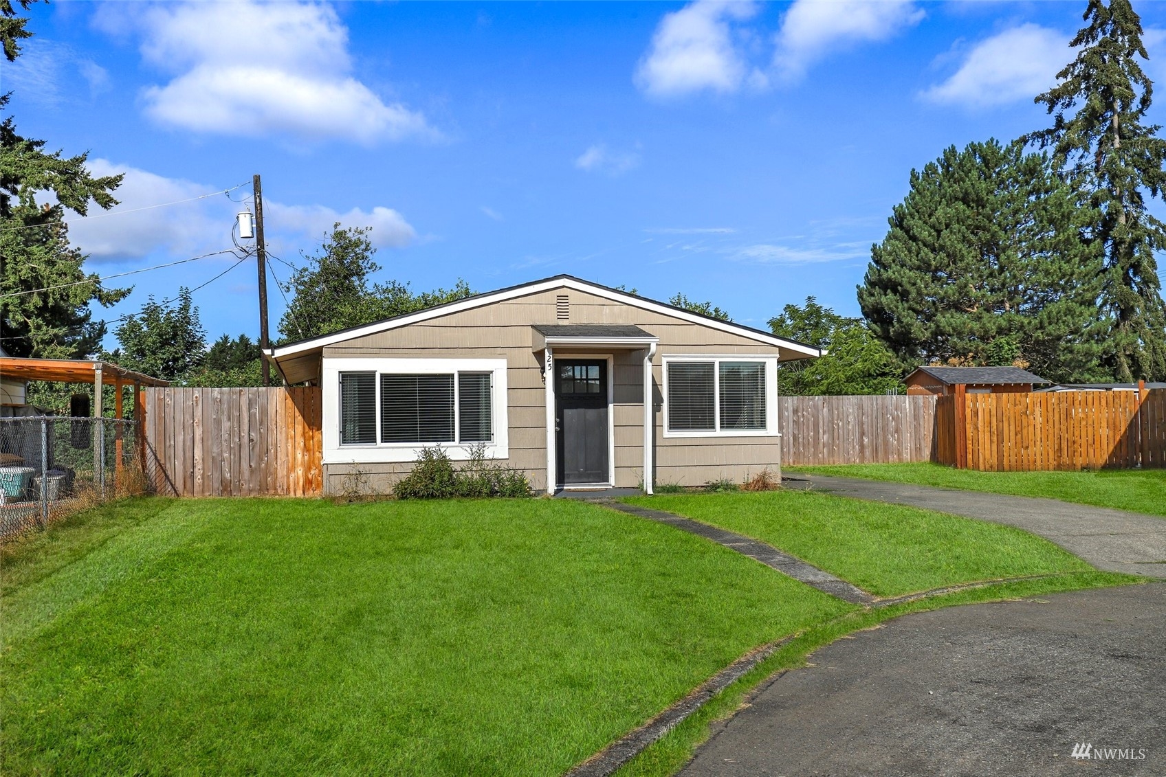 25 Rips Lane Southwest Lakewood, WA 98499 - Photo 3 of 33 a view of a house with a yard and a garden
