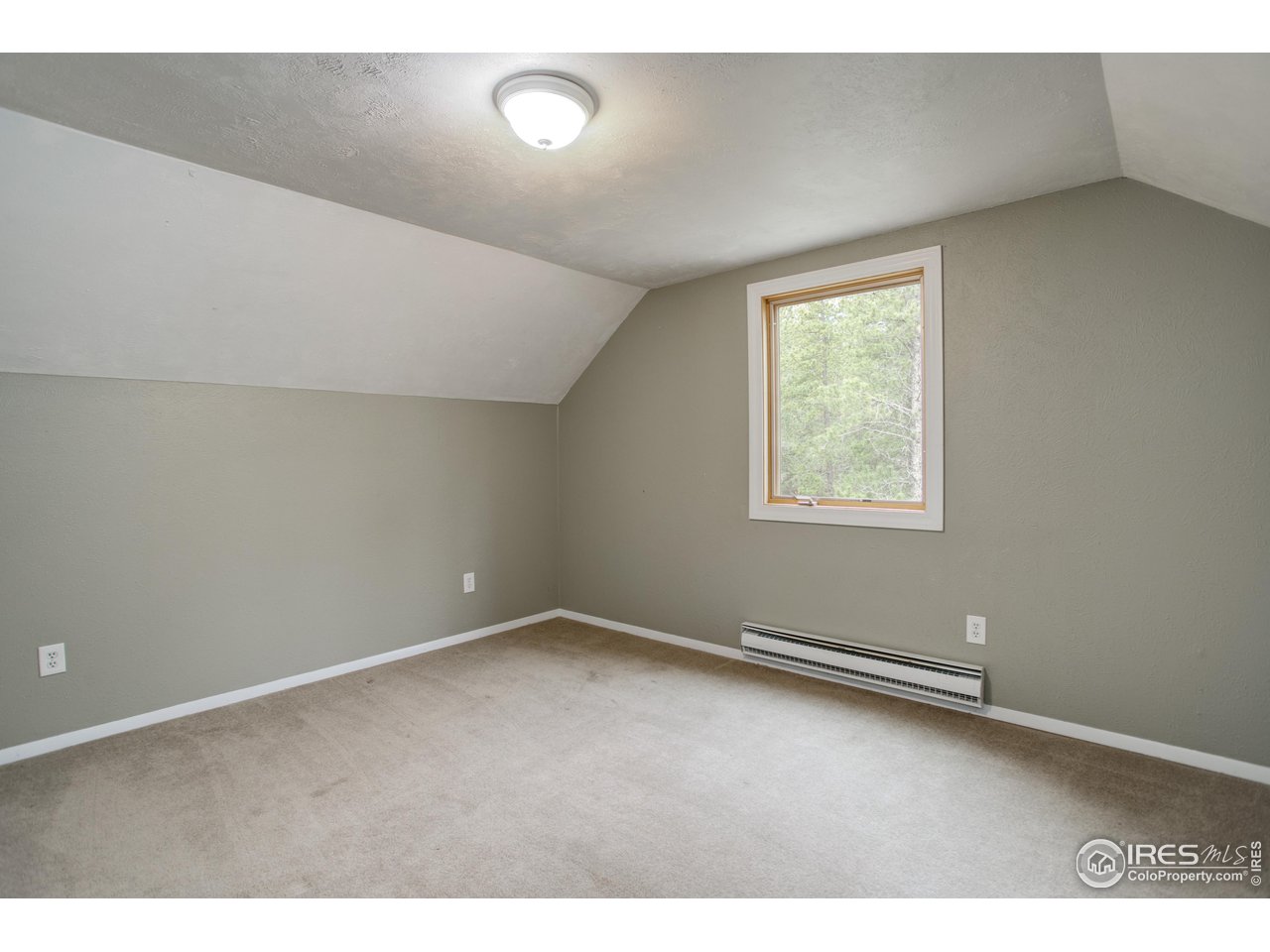 1927 Ridge Road Nederland, CO 80466 - Photo 31 of 38 an empty room with a window