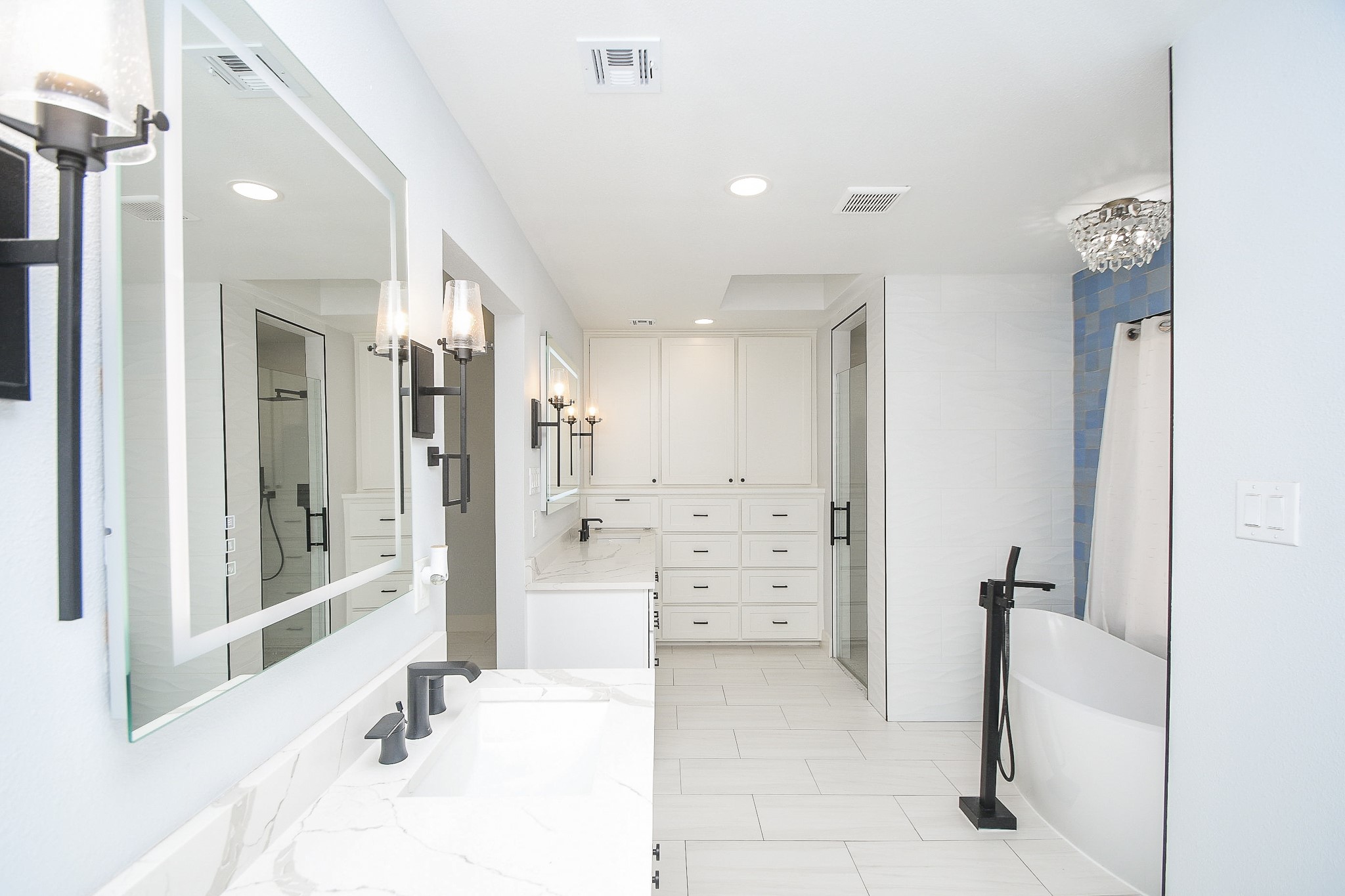 7902 Duffield Lane Houston, TX 77071 - Photo 14 of 31 a bathroom with a tub sink and shower