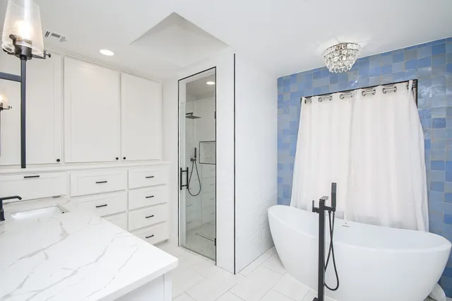 a view of staircase with wooden floor and chair