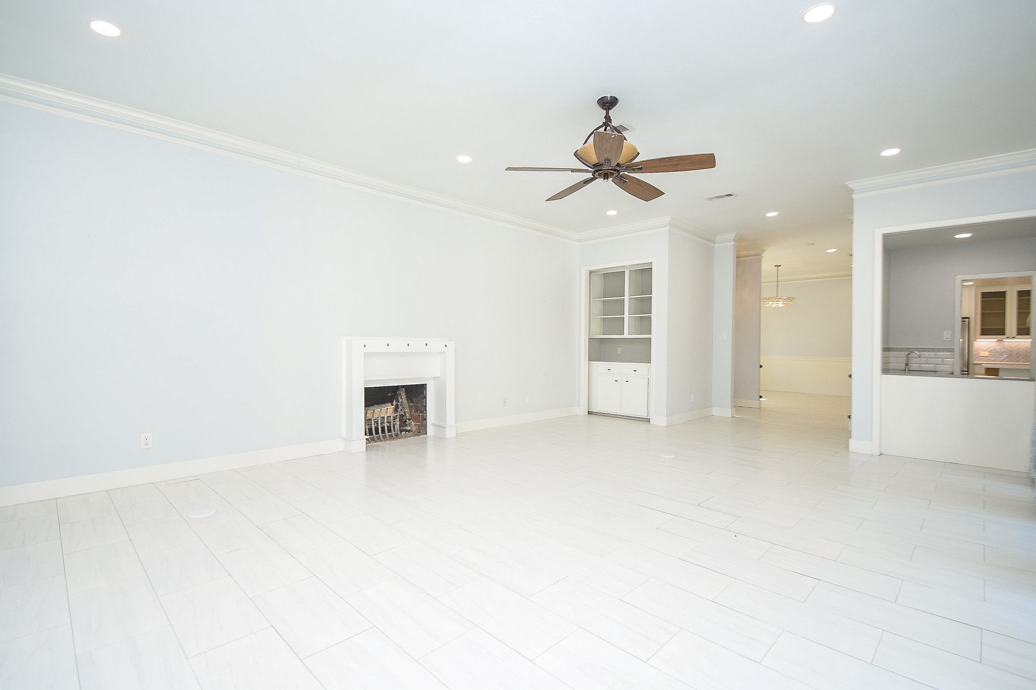 7902 Duffield Lane Houston, TX 77071 - Photo 5 of 31 a view of a living room a ceiling fan and a rug
