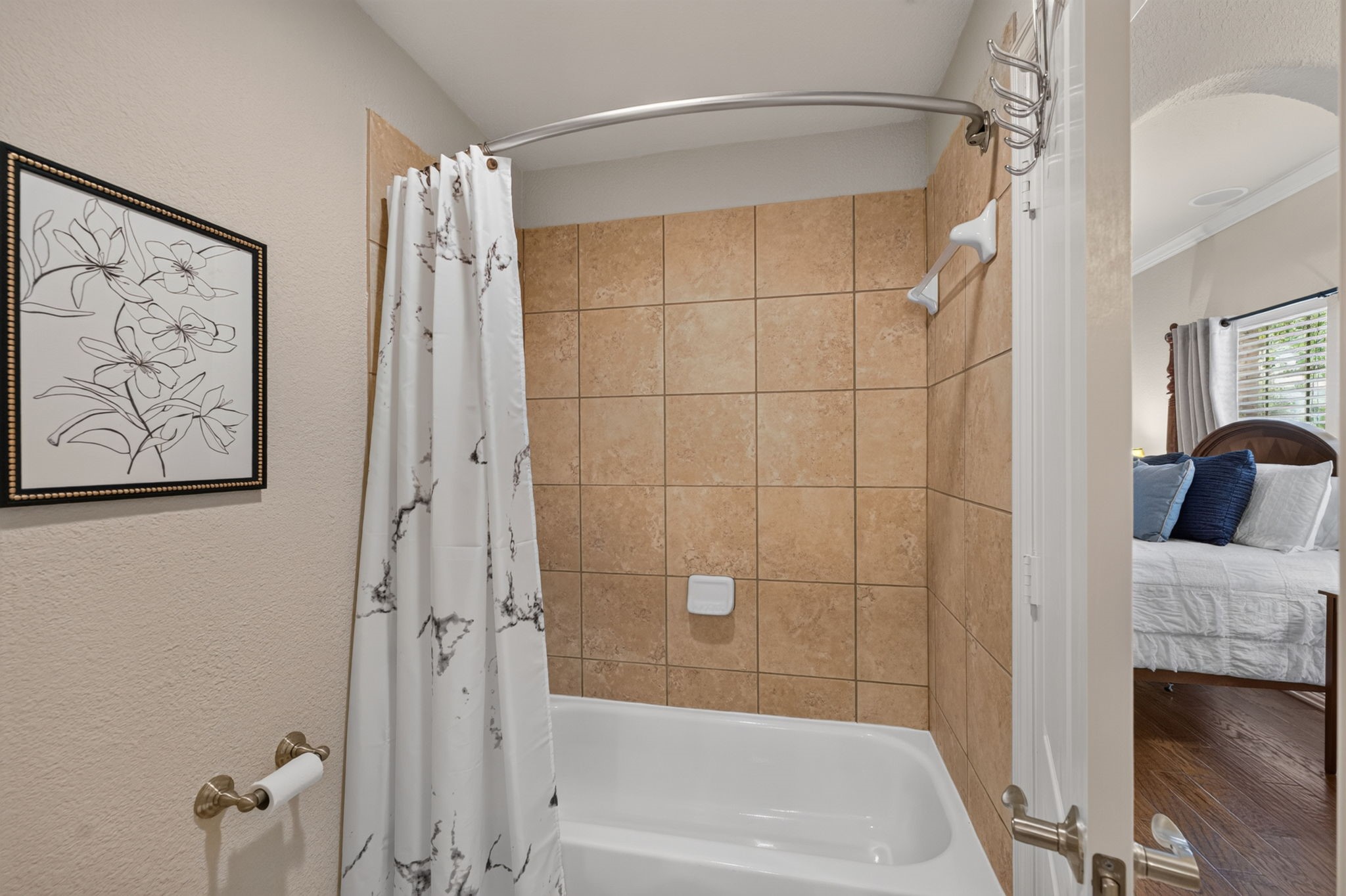 514 Oak Ridge Grove Circle Spring, TX 77386 - Photo 25 of 35 A shared tub, shower and toilet area connects the two private vanities, creating a practical and private bath arrangement.