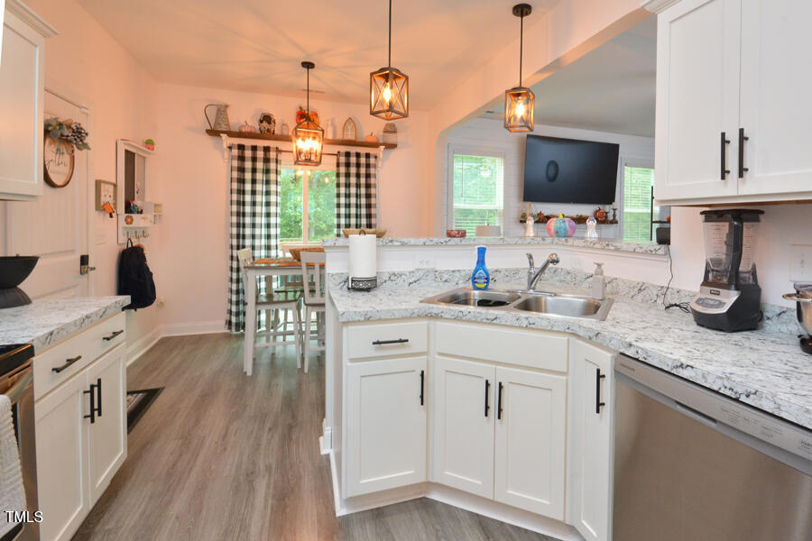 195 Timberwind Road Franklinton, NC 27525 - Photo 14 of 28 a kitchen with sink stove and microwave