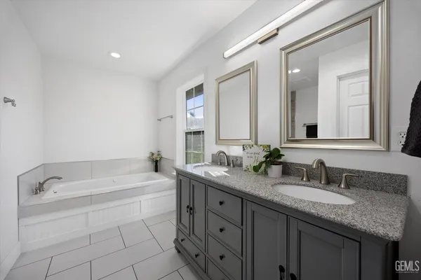 a bathroom with a sink a toilet and a bathtub