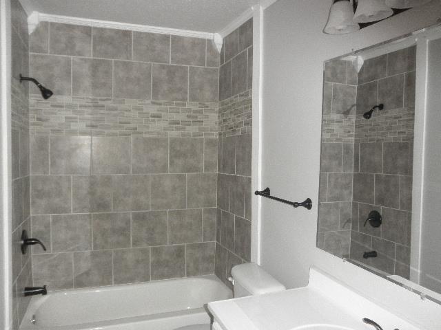 11 Hilltop Road Fayetteville, TN 37334 - Photo 10 of 24 Hall bath features new tub, tile and all fixtures.