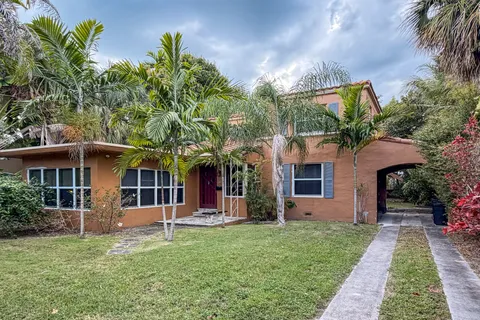 a front view of house with yard