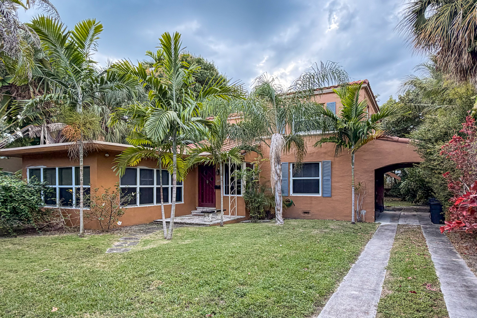 3716 Prairie Avenue Miami Beach, FL 33140 - Photo 3 of 20 a front view of house with yard
