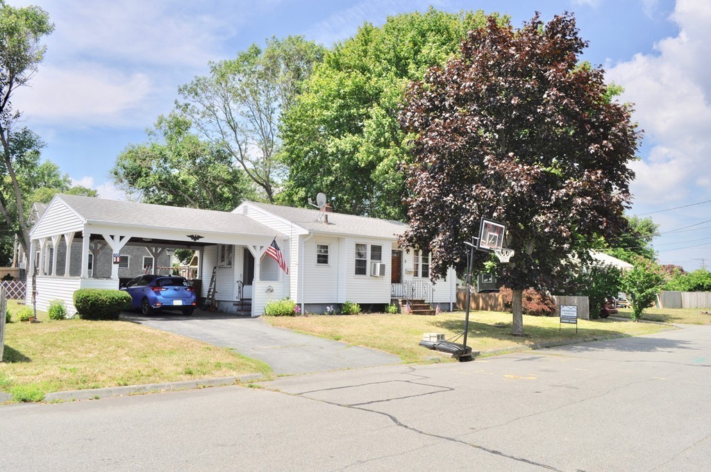 8 Rochambeau Street Fairhaven, MA 02719 - Photo 1 of 10 a view of a house with a large space next to a yard