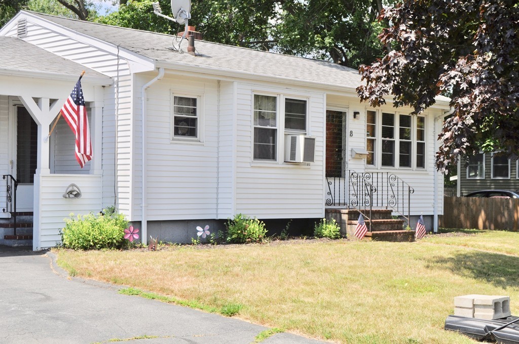 8 Rochambeau Street Fairhaven, MA 02719 - Photo 2 of 10 a front view of a house with a yard