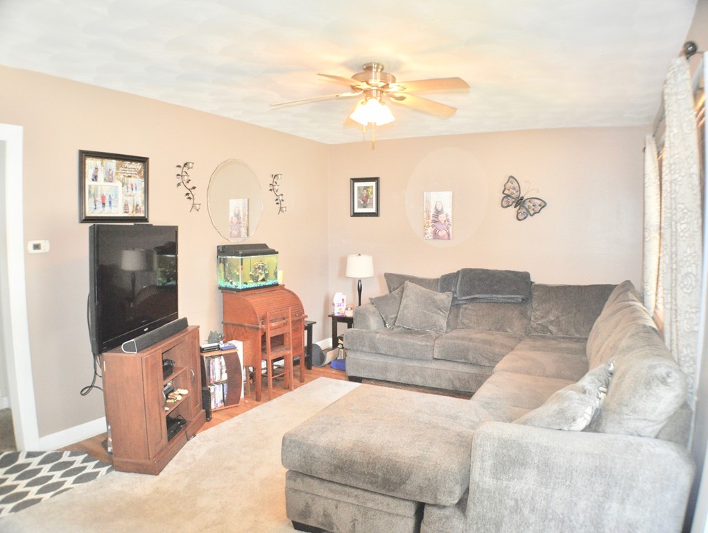 8 Rochambeau Street Fairhaven, MA 02719 - Photo 6 of 10 a living room with furniture and a flat screen tv