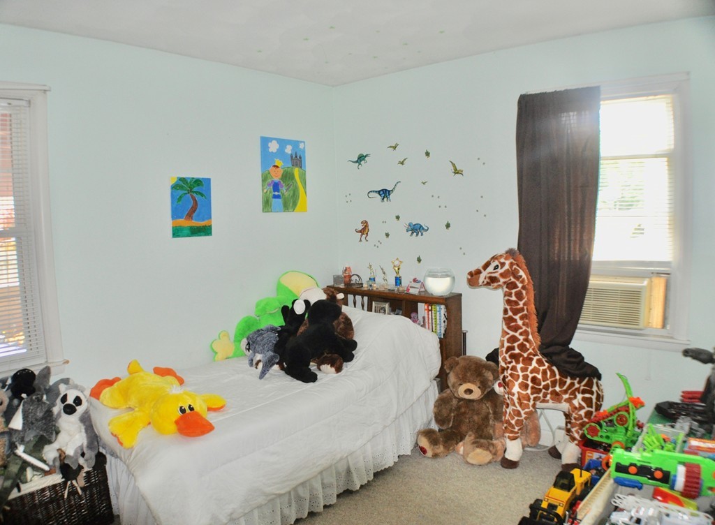 8 Rochambeau Street Fairhaven, MA 02719 - Photo 9 of 10 a bed room with two bed and a window