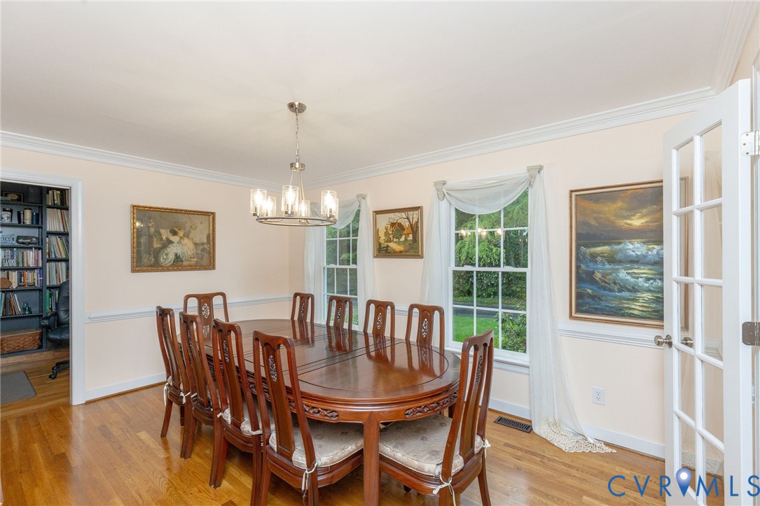 5724 Grove Forest Road Midlothian, VA 23112 - Photo 6 of 47 Dining area featuring hardwood flooring, crown mol