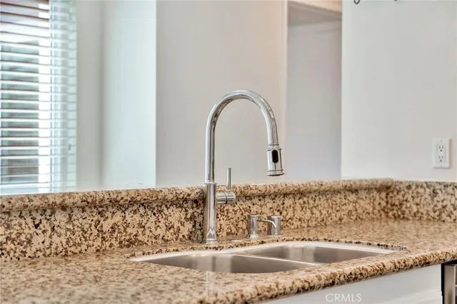 a close view of a sink and a bathroom
