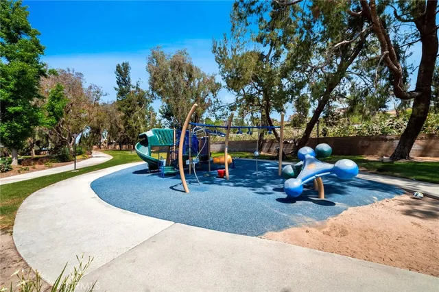 a view of a lake in middle of the forest