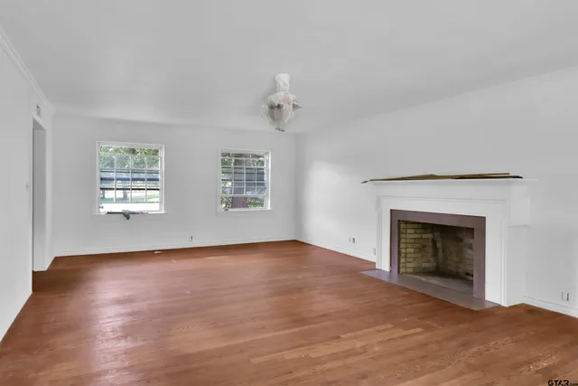 a room with furniture and window