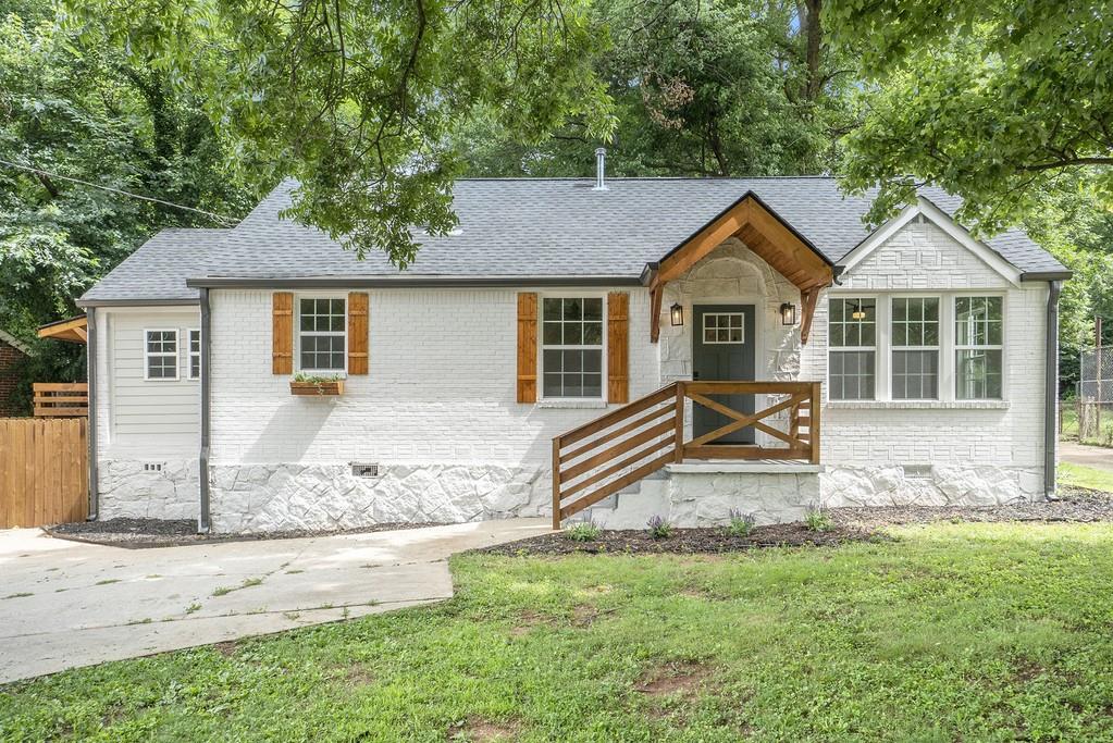 2690 McAfee Road Decatur, GA 30032 - Photo 1 of 1 front view of a house with a yard