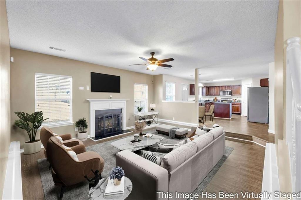 6724 Overlook Ridge College Park, GA 30349 - Photo 7 of 34 a living room with furniture and a fireplace