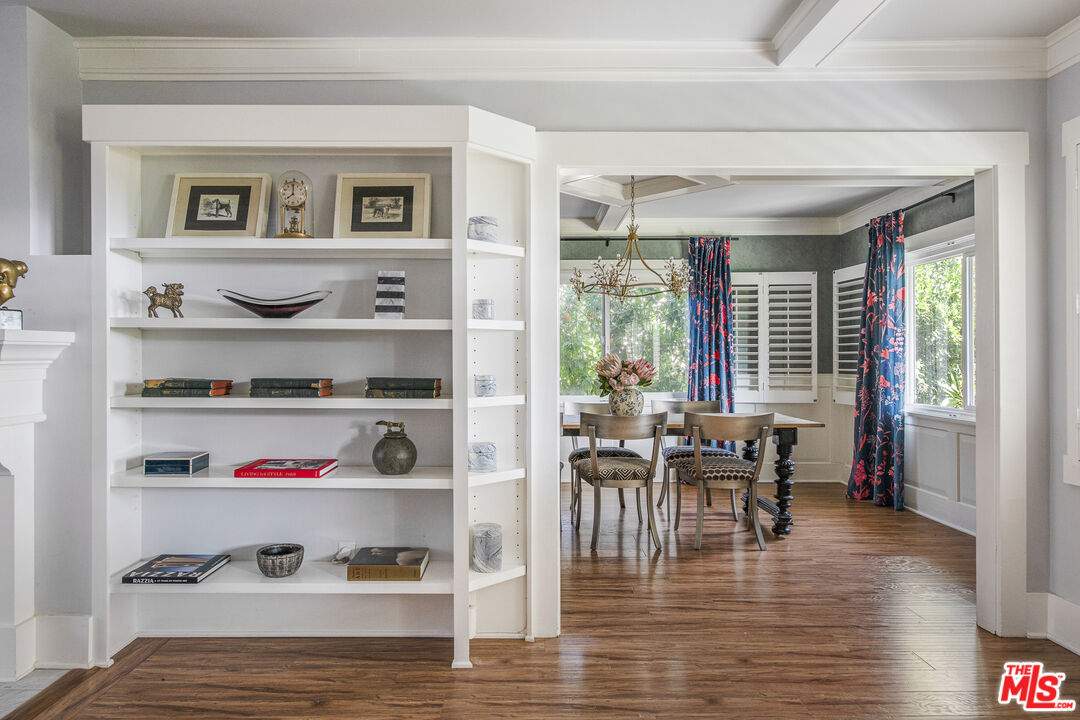55 West Altadena Drive Altadena, CA 91001 - Photo 11 of 42 a view of a dining room with furniture a chandelier and wooden floor