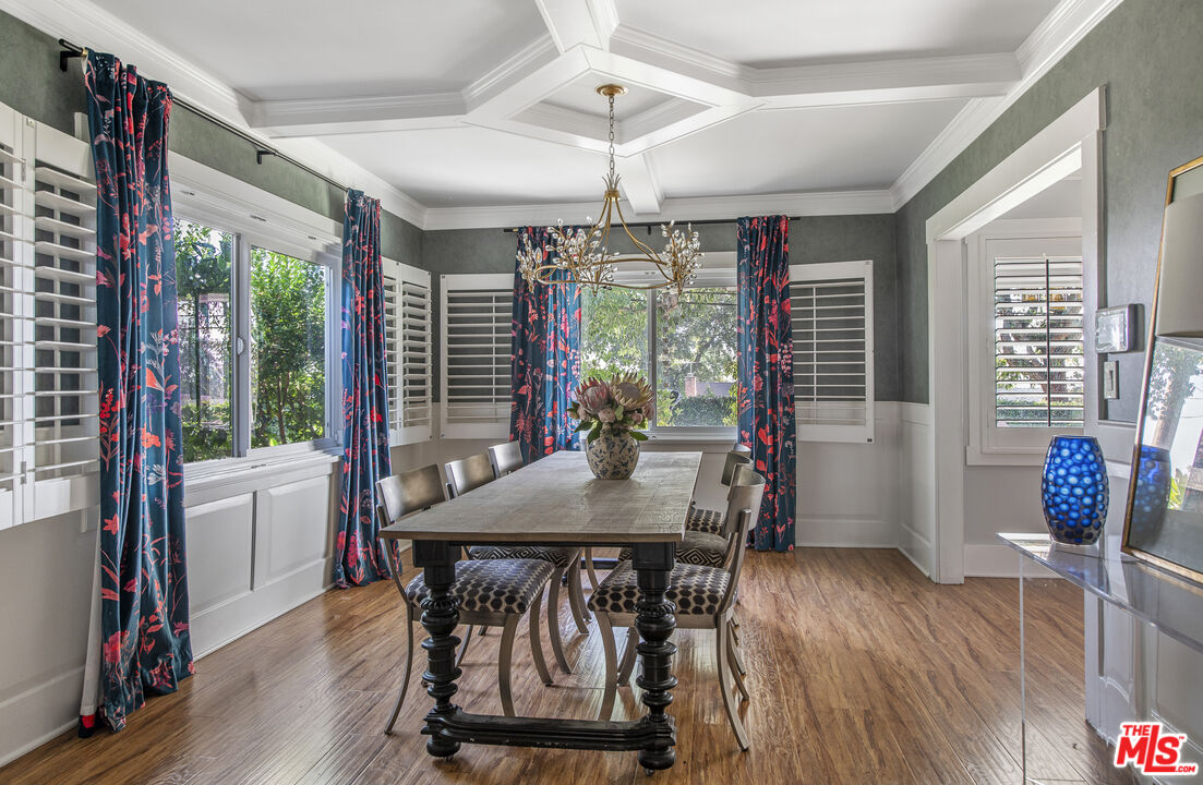 55 West Altadena Drive Altadena, CA 91001 - Photo 12 of 42 a table and chairs in a room next to a window