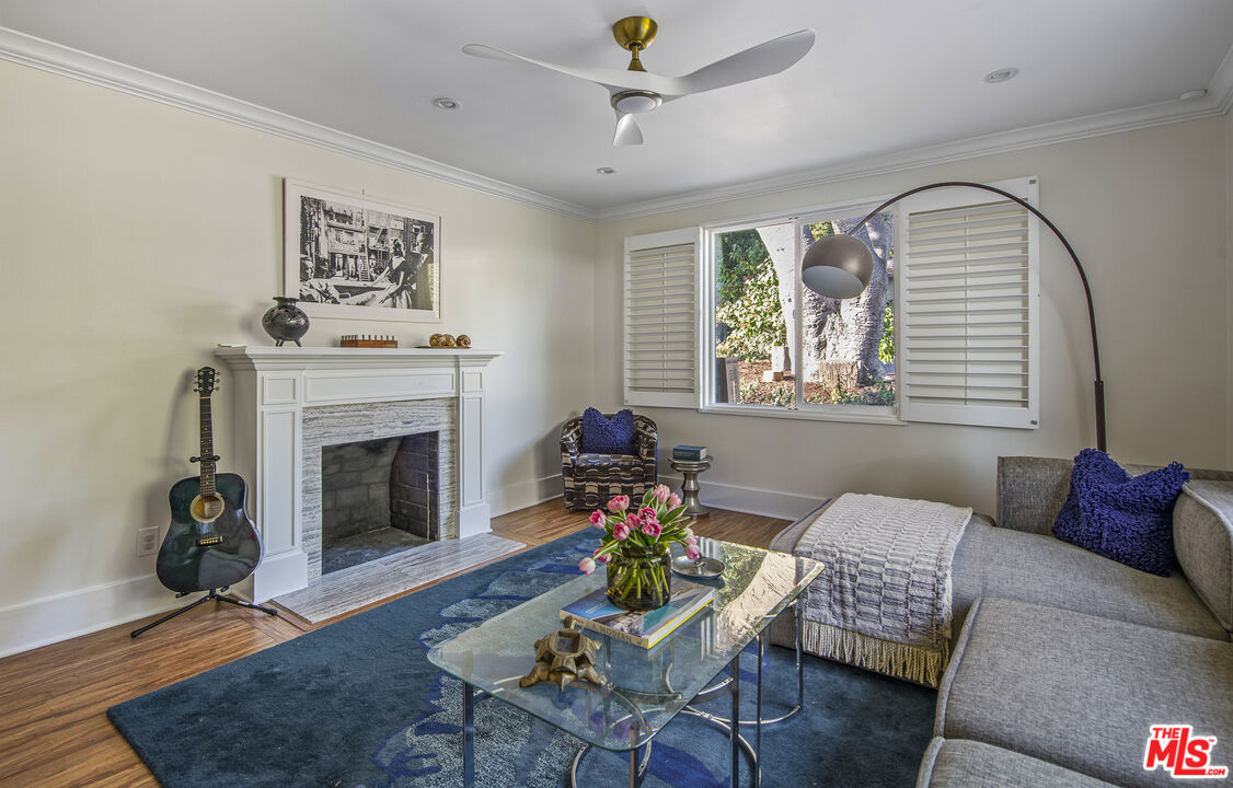 55 West Altadena Drive Altadena, CA 91001 - Photo 20 of 42 a living room with furniture and a fireplace