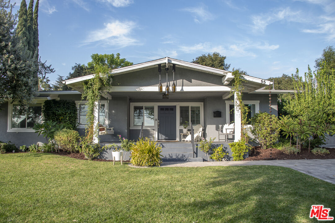55 West Altadena Drive Altadena, CA 91001 - Photo 2 of 42 a front view of a house with garden
