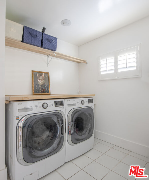 55 West Altadena Drive Altadena, CA 91001 - Photo 33 of 42 a utility room with dryer and washer