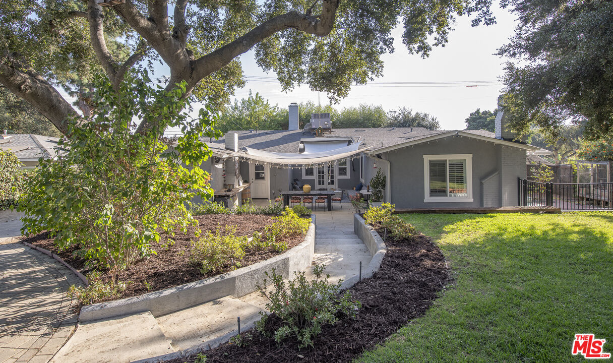55 West Altadena Drive Altadena, CA 91001 - Photo 40 of 42 a front view of a house with garden