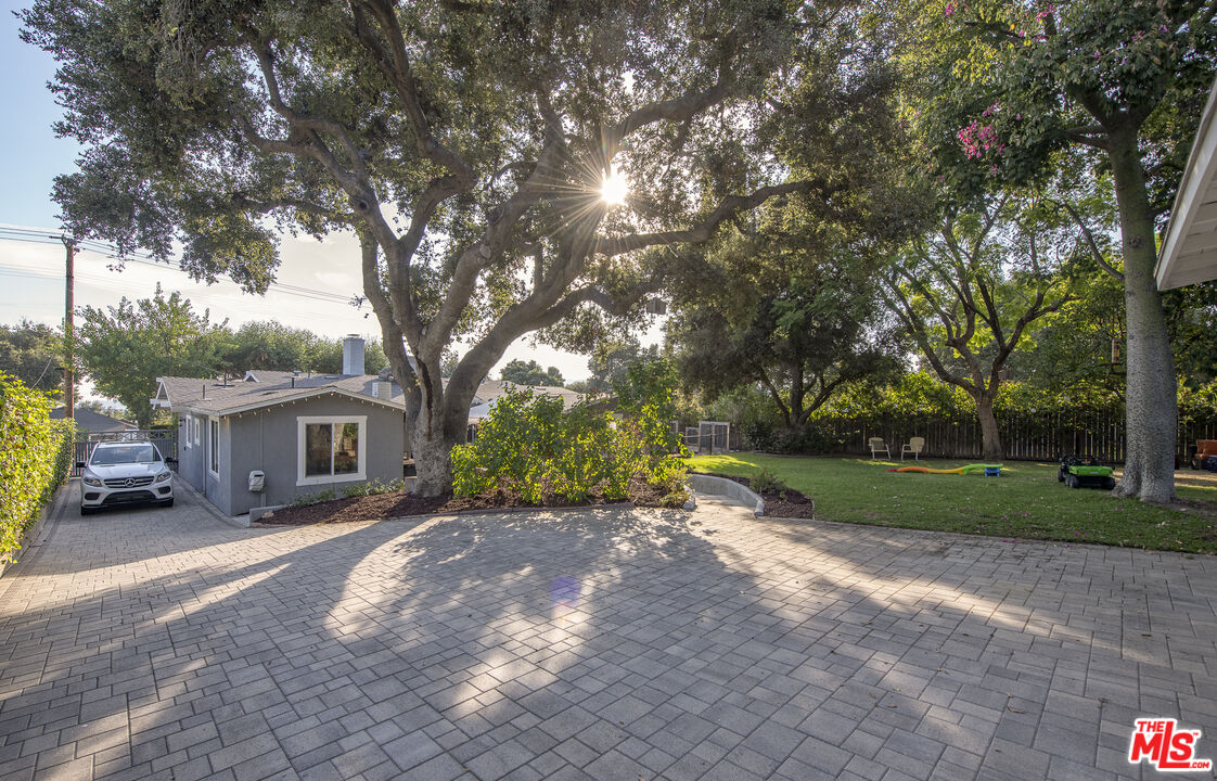 55 West Altadena Drive Altadena, CA 91001 - Photo 41 of 42 a view of a house with a yard